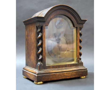 (Possibly Leroy & Fils for) Butt & Co., Chester, a French produced oak cased mantel clock with brass face and a circular dial