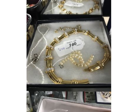 GOLD PLATED & CRYSTAL NECKLACE , PEARL NECKLACE & 2 PEARL BRACELETS