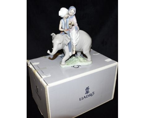 A LLADRO GROUP  model 5352 'Hindu Children', (boxed) Condition Report : good condition Condition reports are offered as a gui