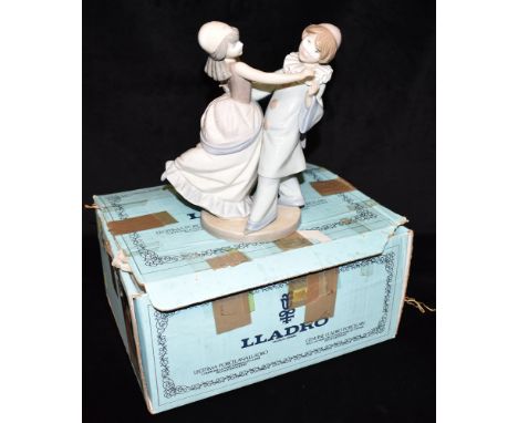 A LLADRO GROUP  model 5452 'Masquerade Ball', (boxed) Condition Report : good condition, box tatty Condition reports are offe