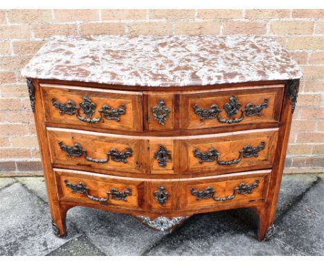 A CONTINENTAL SERPENTINE FRONT MARBLE TOP COMMODE  with two short and three long drawers, 107cm wide 56cm deep 85cm high