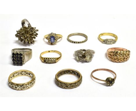 11 ASSORTED RINGS In various styles and sizes, in marked and unmarked yellow and white metal to include gold plated silver, w
