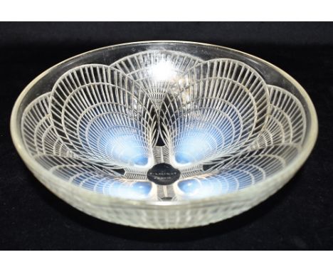 A RENE LALIQUE PRE-WAR OPALESCENT GLASS BOWL  in 'coquilles' pattern, engraved 'R LALIQUE FRANCE', 24cm diameter Condition Re