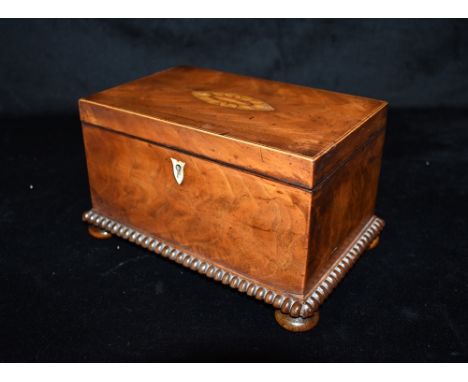 A VICTORIAN MAHOGANY TWIN COMPARTMENT TEA CADDY with marquetry inlaid decoration, 21cm wide Condition Report : no key, but ot