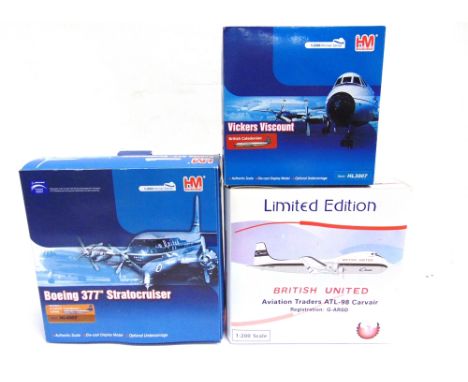 THREE 1/200 SCALE DIECAST MODEL AIRCRAFT  comprising a Hobbymaster No.HL4002, Boeing 377 Stratocruiser 'B.O.A.C.', G-AKGH; Ho