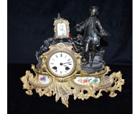 A FRENCH SPELTER AND GILT METAL FIGURAL MANTLE CLOCK  the 8-day Marti &amp; Co movement striking on a bell, 38cm wide Conditi