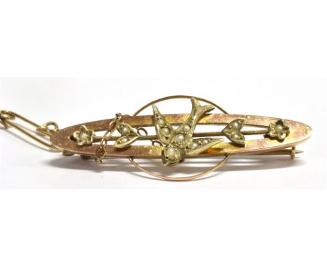A MARKED 9CT SEED PEARL SWALLOW BAR BROOCH Length 3.9cm, weight to include metal pin 2.2g NB C clasp and safety chain