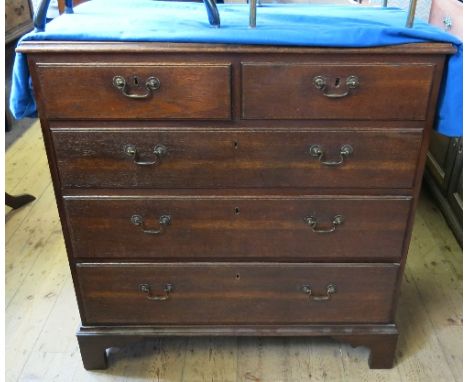 A 19th century oak chest, of two short drawers over three long drawers, raised on bracket feet, width 38ins 