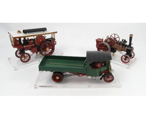 Three scale models, to include a Fodens flat bed steam engine, a Royal Chester steam engine NU7483, and another traction engi