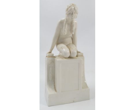 An unmarked Royal Worcester Art Deco blank figure, of a female nude kneeling on a plinth, height 8.25ins