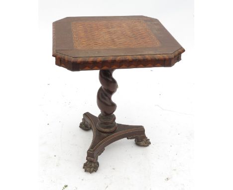 An Antique occasional table, the square top with rebated corners and central parquetry inlay, with bold turned column termina