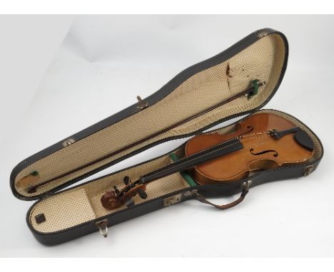 A cased violin, with two piece back, bearing label for Antonius Stradivarius Cremonensis made in Czechoslovakia, length inclu