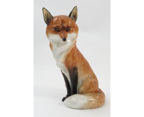 A Royal Worcester model, of a seated fox, model number 2993, dated 1937, height 7ins