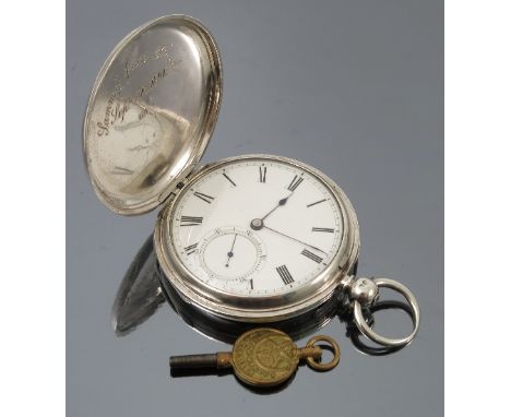 A silver hunter pocket watch, with white enamel dial, black Roman numerals, hands and subsidiary seconds dial, four piece hin