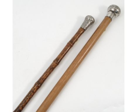 A walking stick, with bamboo shaft, the white metal cap with woven decoration, together with another walking stick having a h