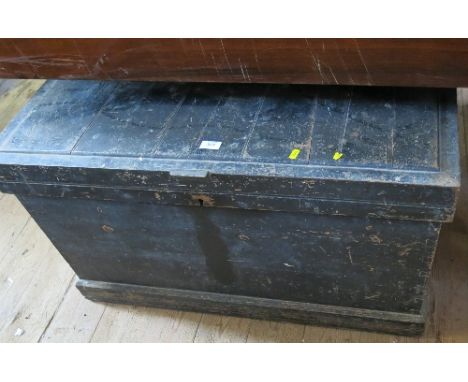 A stained pine carpenters chest, containing various wood working and other tools
