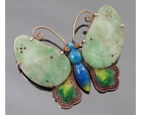 A jade and enamel butterfly brooch, possibly Chinese, diameter 4.5cm, together with an enamel butterfly brooch, possibly by J