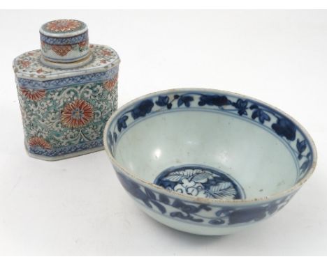 A Qianlong tea caddy, decorated with flowers, height 4.5ins, together with a blue and white Chinese bowl, diameter 6ins 