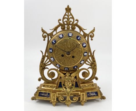A 19th century French gilt metal mantel clock, the striking movement marked A.D in an oval and 1160, the gilt embossed convex