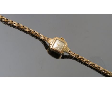 A ladies Tissot 9ct gold bracelet watch, weight 13g gross