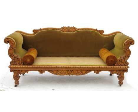 A pale mahogany double end sofa, with carved scrolling acanthus frame, width 82ins