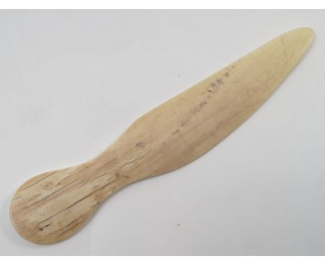 A 19th century ivory page knife, in the shape of a curved dagger, length 10ins 
