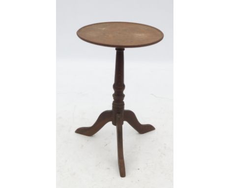 A 19th century oak circular table, the dish top raised on a tripod base, diameter 18ins 