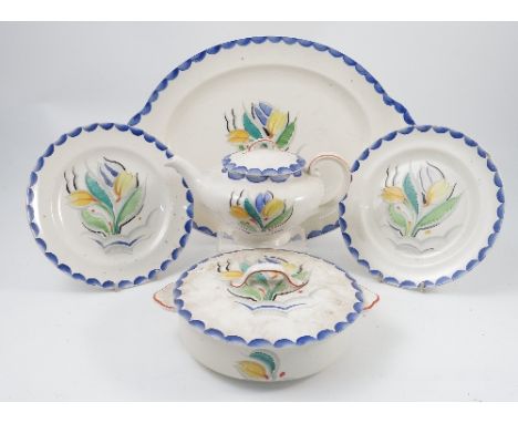 A Gray's Pottery Susie Cooper designed part dinner service, decorated in the Tulip pattern, comprising two meat plates, seven