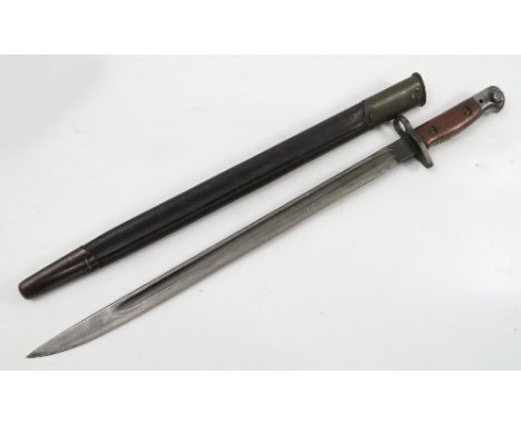 A bayonet, by Wilkinson, with a leather scabbard, blade length 17ins