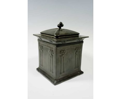 A Tudric pewter biscuit box in the style of Archibald Knox with lift off lid the sides with stylised flower heads and tendril