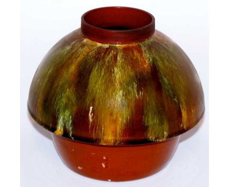 A Linthorpe pottery terracotta vase in the manner of Christopher Dresser with ribbed cylindrical neck the mushroom shaped bod