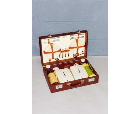 A Sirram picnic set in faux snake skin case with chromium plated fittings, 50 cm wide, 32 cm deep, 15 cm high, Circa 1950s