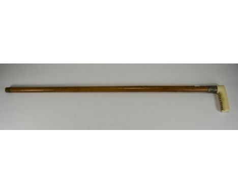 A Vintage Ivory Handled Walking Cane. Length 34 inches. Overall Condition Very Good.