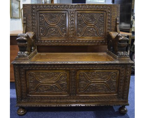 19thC Oak Carved Monks Bench Profusely Carved Throughout, Panelled Front, Sides And Top, Stylised Lion Armrests, Hinged Seat,