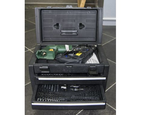 Black Boxed Cougar Drill, with two drawers of tools etc. Together with a Bosch Drill (Battery Missing).