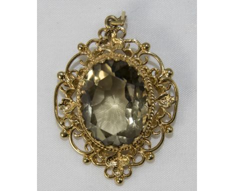 A Vintage Ornate and Open Worked 9ct Gold Pendant with a Large Faceted Pale Topaz of Over 20 cts Fully Hallmarked 9.375. 1.5 