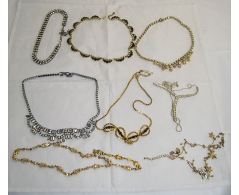 Collection of Crystal Necklaces comprising a fringe front AB necklace, an AB and black crystal necklace, an AB and faux seed 