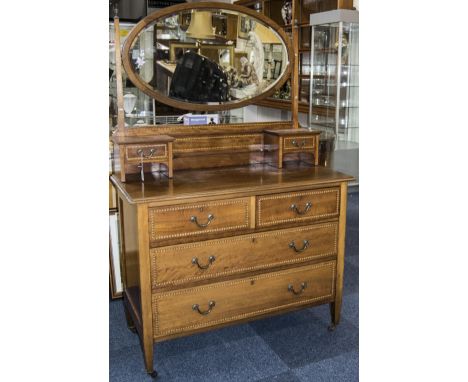 Edwardian Mahogany Inlaid Dressing Table, Oval Mirror Raised On Tapering Supports With Glass Urn Shaped Finials Above A Short