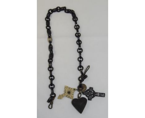 A 19th Century Whitby Jet Necklace with Attached Celtic Crosses ( 2 ) and Carved Heart Shaped Pendant In Jet, 18 Inches In Le