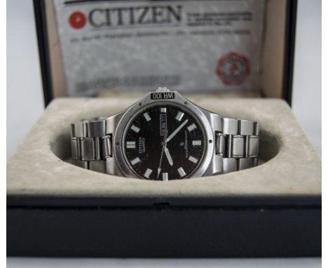 A Vintage Citizen - Date-Just Quartz Stainless Steel Gents Wrist Watch. Model No.510 5840. 20500187 Manufactures Num. Black D