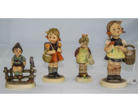 Hummel Figures ( 4 ) In Total. Various Subjects and Sizes. All Figures are In Excellent Condition. Tallest Figure 6 Inches Hi