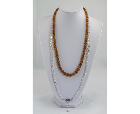 A Vintage Amber Bead Necklace of 24 Inches In Length, Set with a Circular Silver Clasp, Also a Vintage Crystal Necklace and D