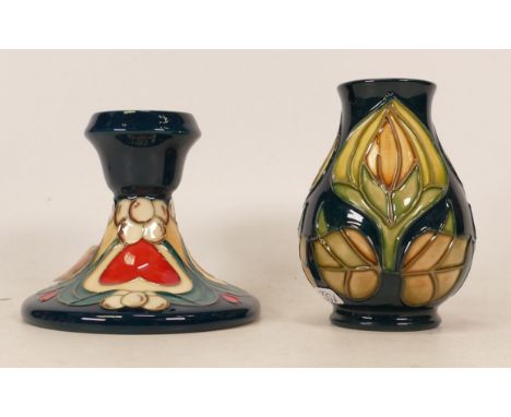 Moorcroft candlestick in the Winter Legacy pattern, trial piece 24/9/2012 together floral decorated vase (2) 