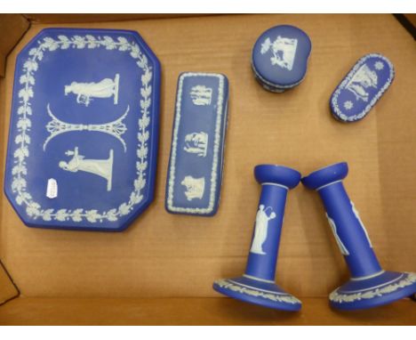 Wedgwood blue dip jasperware ladies dressing table items to include tray, pair of candle stick holders &amp; 3 lidded boxes (