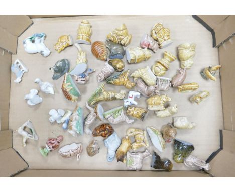 A collection of Wade Whimsies to include lion, monkey, bears, dinosaurs, some first edition whimsies, etc (1 tray) 