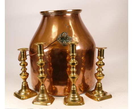 Copper milk churn together with 4 brass candlestick holders (5) 