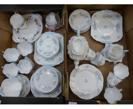 Extensive blue rock tea ware items consisting of Teapot, two cake plates, sugar bowl, 2 milk jugs, 12 side plates, 6 salad pl