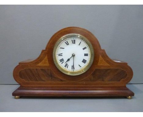 An Edwardian style inlaid mahogany mantle clock with a French movement. 