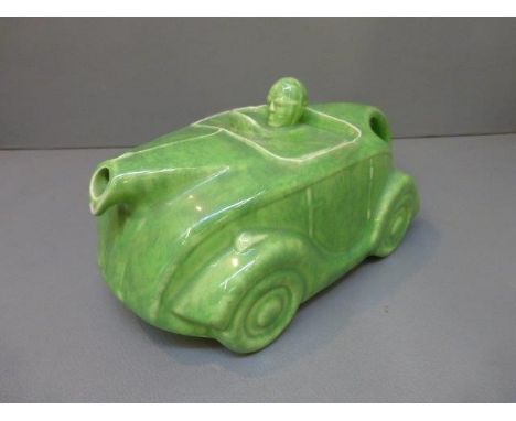 A 1940s Sadler teapot in the form of a racing car. 