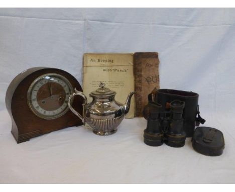 An oak cased Dubros mantle clock, a cased pair of binoculars with inscribed name and dated 1913, a copy of 'An Evening with P